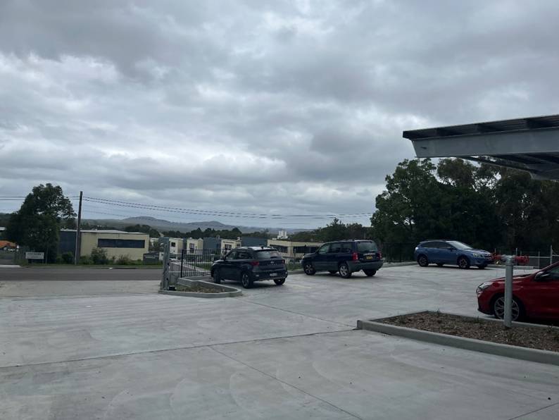 Cars parked cars in a parking lot

AI-generated content may be incorrect.