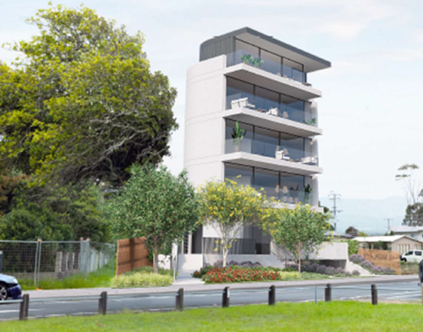 A building with trees and grass

AI-generated content may be incorrect.